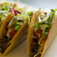 American Tacos · Bravo style taco - BBQ short ribs, tabasco onions, melted pepper jack cheese, green leaf let...