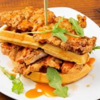 Chicken And Waffles
 · Sriracha honey mustard and spicy maple syrup.