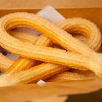 Churros Box · Most popular. 4 Pieces of 5-6 inch-long loop shape churros serving with cinnamon sugar.
