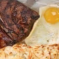 Steak & Eggs · N.Y. Strips with Grilled Tomatoes, Eggs, Potatoes & Toast.