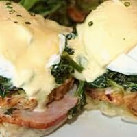 Spinach Benedict · Two Poached Eggs, Spinach & Hollandaise Sauce on an English Muffin, served with Potatoes.