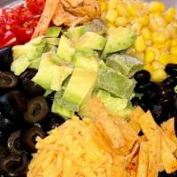 Jjs Own Taco Salad · Romaine lettuce, tomatoes, corn, black beans, black olives, cheddar cheese, tortilla strips ...