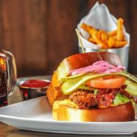 Country Fried Chicken Sandwich · Fried chicken breast, bacon, lettuce, tomato, pickles, pickled red onions, chipotle mayo.
