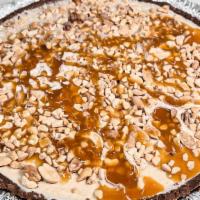 Snicker Pie · FROYO PIE
CRUST: Chocolate 
FROYO: Sea Salt Caramel
Topped off with: Peanuts & Caramel 
Driz...