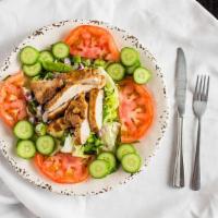 Grilled Chicken Over Large Salad · 