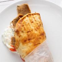 Gyro Pita · Traditional sliced lamb from the rotisserie.