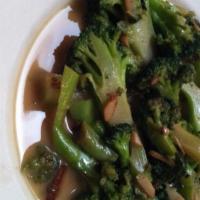 Broccoli · Fresh broccoli sautéed in olive oil and fresh garlic.