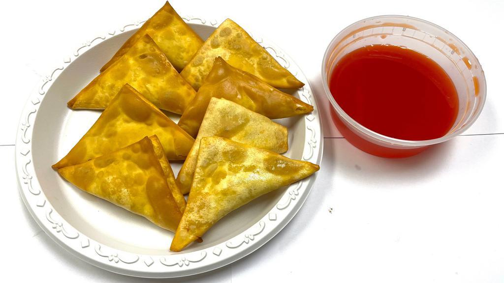 Crab Rangoon · Eight pieces, service with sweet and sour sauce.