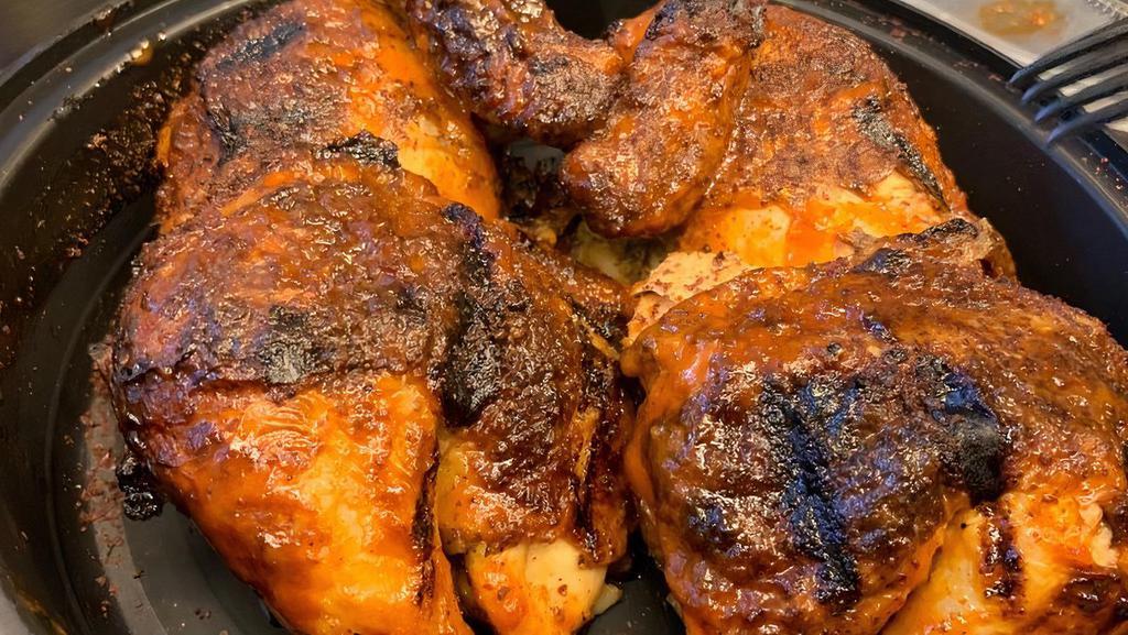 Whole Chicken  · A whole rotisserie chicken in an authentic house marination.