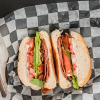Pblt · Pork roll, bacon, lettuce, and tomato with mayo on a hard roll.
