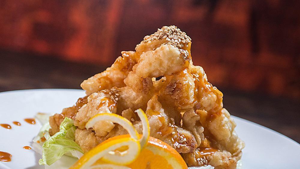 New Rocky Shrimp · Lightly battered deep fried shrimp with special sauce on lettuce.