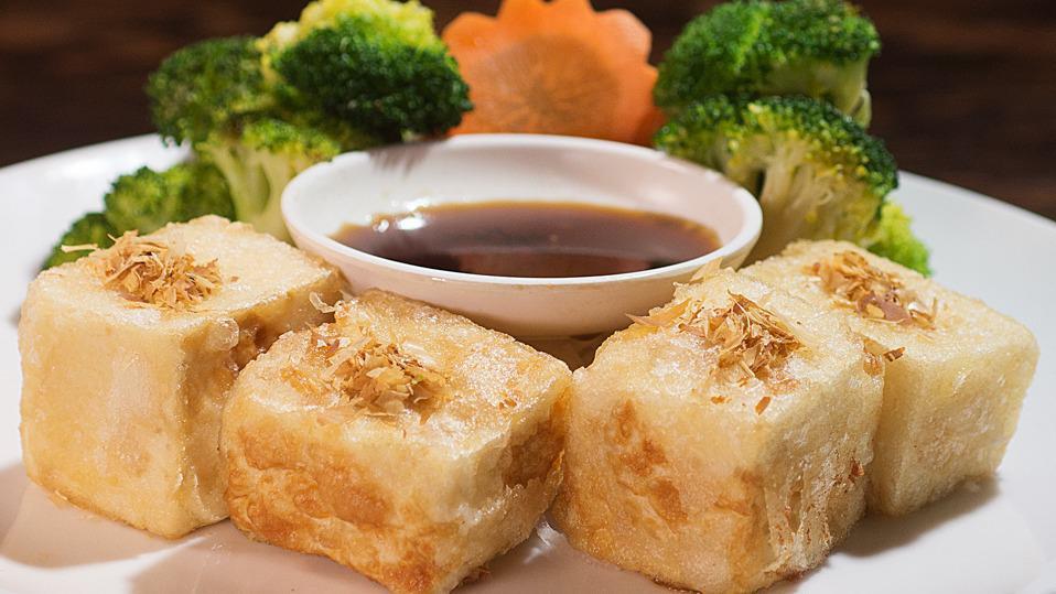 Age To-Fu · Deep fried bean curd sprinkles with fish flakes served with special sauce.