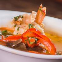 Tom Yum · Thai hot and sour with shrimp and mushroom.