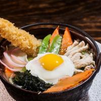 Nabeyaki Udon · Noodles with Shrimp, fishcake, chicken, vegetables and egg in stew style.