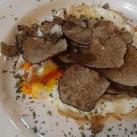 Uovo Al Tartufo Nero · Slow-cooked egg, prosciutto and black truffle.
