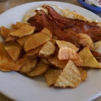 Baked Potato With Bacon Strips & Cheddar Cheese · 