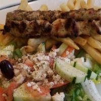 Chicken Souvlaki Platter · Served with french fries, Greek salad, and pita bread.