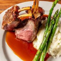 Oven Roast Rack Of Lamb · Served with mashed potatoes and vegetable.