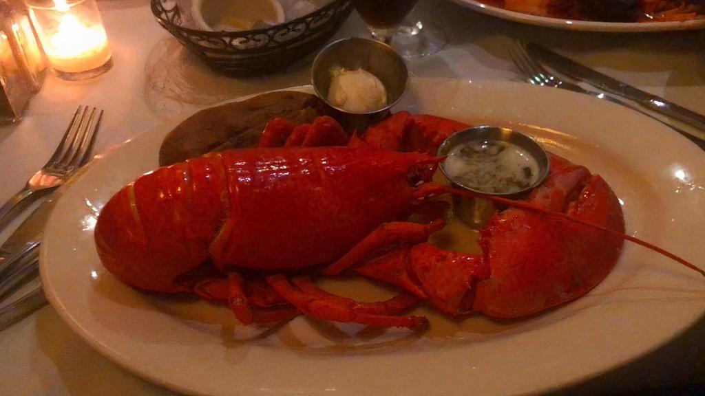 Broiled Lobster Tail · Served with roasted red potatoes and vegetable.