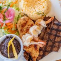 La Fuente Dish / Bandeja La Fuente · Grilled Steak Chicken, shrimp, rice, beans, and salad. / Carne de res, pollo, camarones, arr...