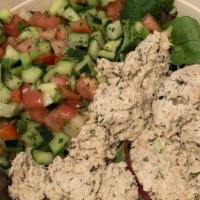 Tuna Salad · Mixed with mayo, celery onion, fresh dill, greens, and sliced tomato.