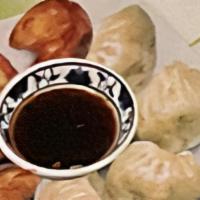 Meat Dumplings · Eight pieces. Steamed or pan fried.