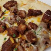 Chipotle Chicken Pizza (Medium) · Fried chicken tossed in sweet chipotle BBQ sauce with cheddar cheese & ranch dressing.