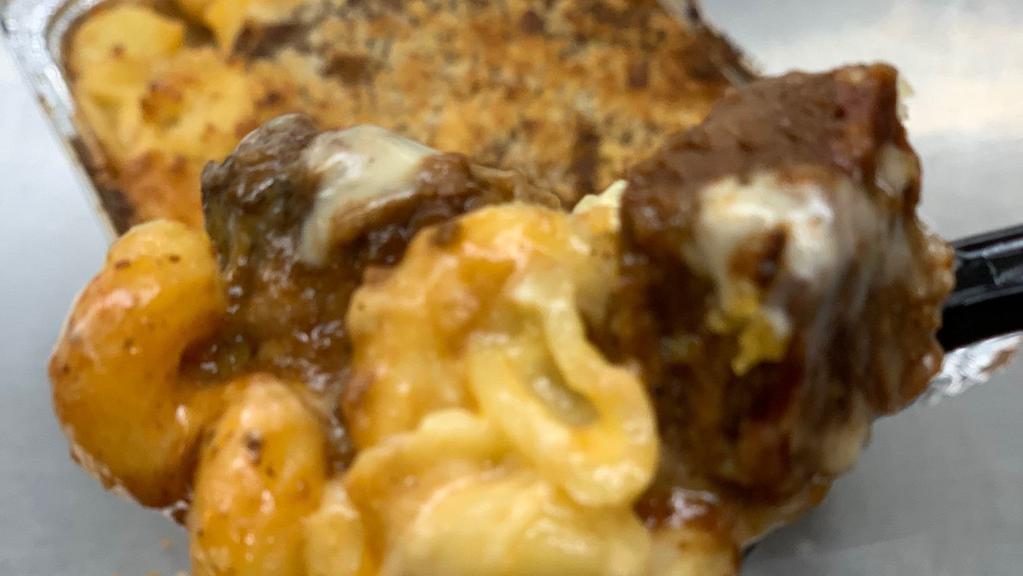 Burnt Ends Brisket Mac & Cheese · Huge pieces of smoked beef brisket burnt ends caramelized in Dr Pepper and barbecue sauce, Pepper Jack cheese and topped with breadcrumbs and butter.