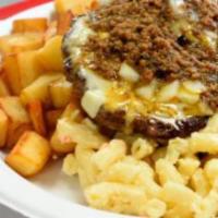 Roc The Garbage Mac & Cheese · Spin on the ‘plate’ with grilled burger, chunks of potatoes and meat sauce. Topped with brea...