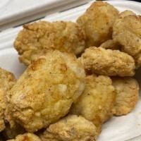 Kids Pack (Plain Mac, 8 Nuggets And Tots) · Plain Jane Mac, eight air fried nuggets with two dips and order of tater tots for all the ki...