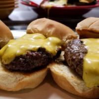 Sliders · Three pieces. Add choice of cheese for an additional charge.