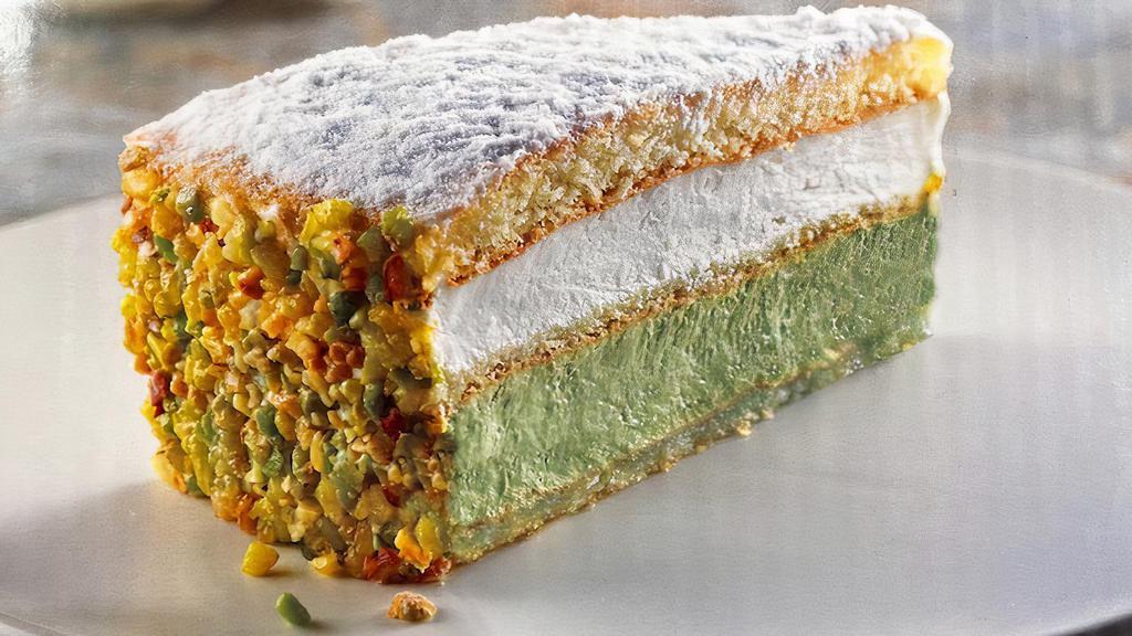 Pistachio Cake · Layers of sponge cake ,pistachio and ricotta creams, decorated with pistachio pieces