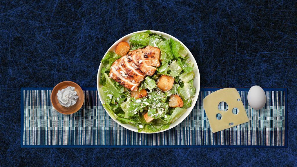 Chicken Caesar Salad · Grilled chicken, romaine, croutons, Parmesan cheese, and creamy Caesar dressing.