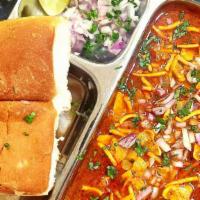 Misal Pav (Spicy) · Misal pav is a popular Maharashtrian street food consisting of a sprouts curry