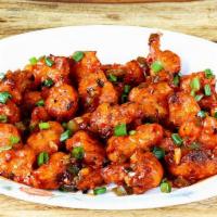 Gobi Manchurian (Gf,V) · Popular Indian Chinese dish. The cauliflower has a crispy coating and is tossed with a mouth...