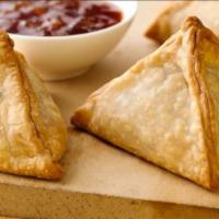 Gluten-Free Samosas (2 Pc) · 2 pieces Indian fried gluten-free pastry with a savory filling such as spiced potatoes, onio...