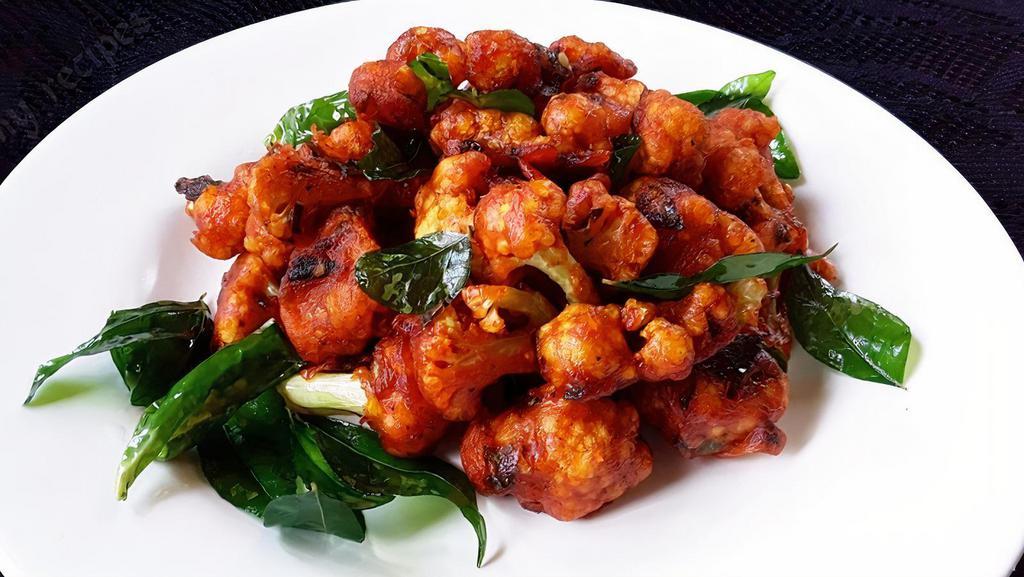 Gobi 65 (Gf,V) · Gobi 65 is a south Indian snack made of fried cauliflower, spices and herbs. It can also be served as a starter or as a side in a meal.