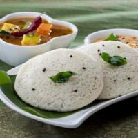 Idli  (Gf,V) 2 Pc · Steamed rice and lentil patties served with coconut chutney and sambar.