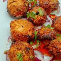 Achari Mushrooms · A tasty, spicy dish of mushrooms cooked with nigella and fennel seeds--spices commonly used ...