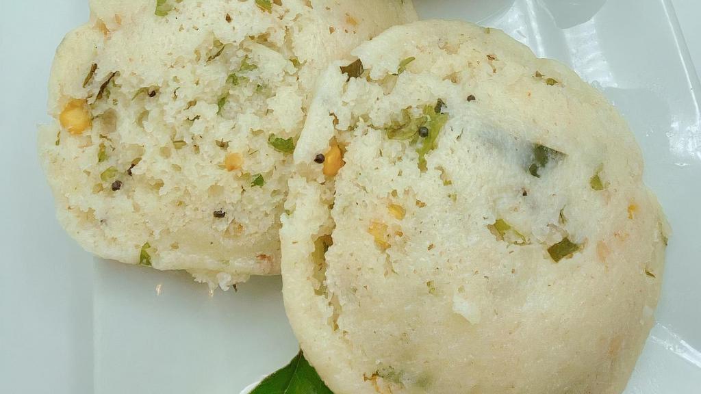 Rava Idli (2 Pc) · Rava idli are steamed cakes made with semolina, yogurt, spices, veggies