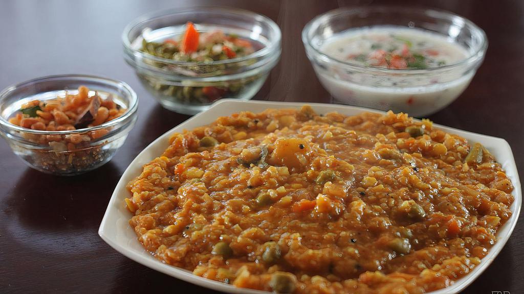 Bisi Bele Bath (Has Nuts) · Spicy. Popular Karnataka dish which literally “hot lentil rice” is a spicy one pot rice, cooked with sambar and served with papad & achar.