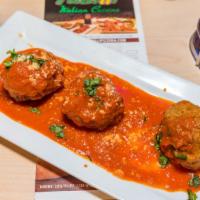 Meatballs (3 Pieces) · In tomato sauce.