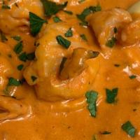 Lobster Ravioli · In a creamy pink sauce with shrimp.