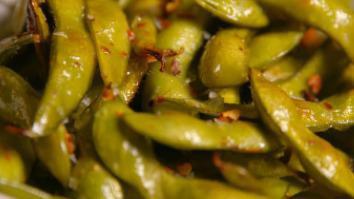 Edamame · Fresh soy beans steamed in their pod. Sprinkled with sea salt.