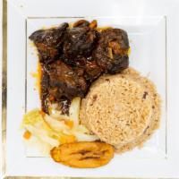 Stewed Chicken Meal · Served with rice and peas or white rice and 1 side. Extra meat for an additional charge.