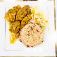 Curry Chicken Lunch Special · Served with rice and peas or white rice, steamed vegetables and iced tea or lemonade.