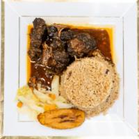 Oxtails Meal · Served with rice and peas or white rice and 1 side. Extra meat for an additional charge.