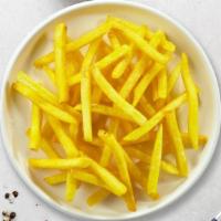 Golden Finger Chips · Crispy potatoes fried until golden- garnished with sea salt and spices.
