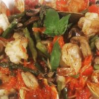 Linguini Frutti Di Mare · Clams, mussels, calamari, shrimp in a light tomato sauce.
