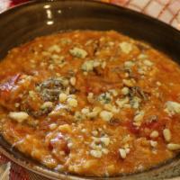 Braised Veal & Gorgonzola Risotto · Veal demi-glace, white wine, roasted tomato, pine nuts, fresh sage.